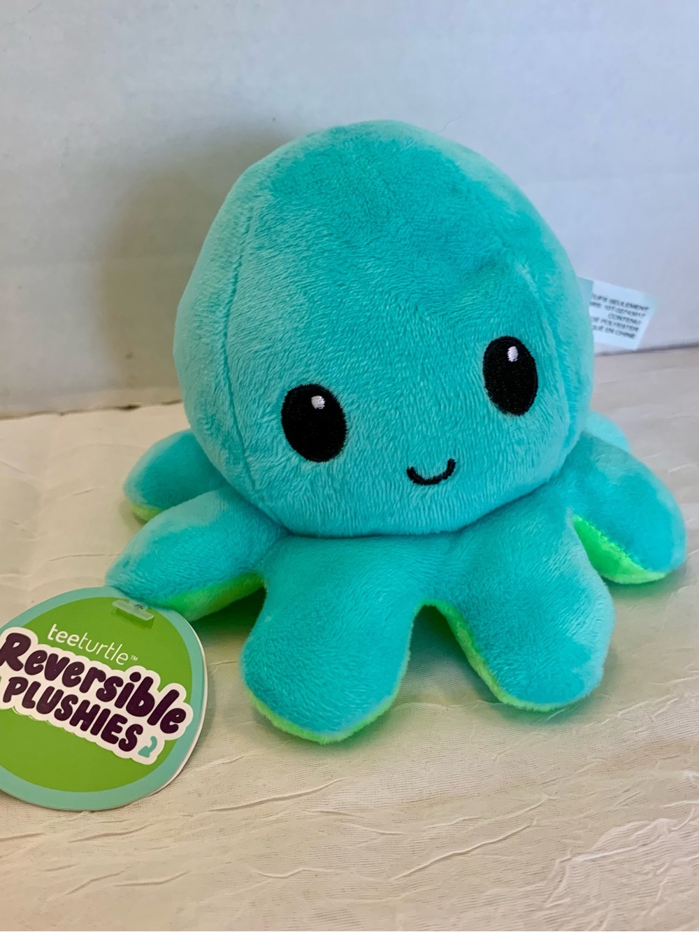 authentic TeeTurtle Reversible Octopus Plushie in an aqua